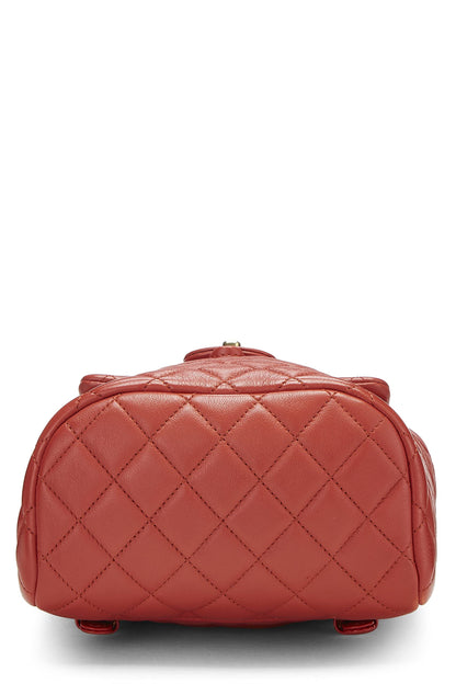 Chanel, Mini sac à dos Urban Spirit en cuir d'agneau matelassé orange d'occasion, Orange