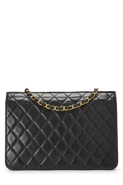 Chanel, sac à rabat en cuir d'agneau matelassé noir d'occasion, taille M, noir