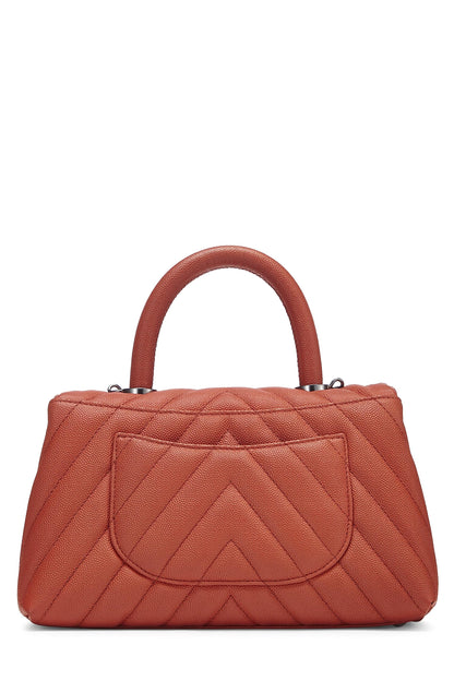 Chanel, sac à poignée en coco caviar orange chevron petit modèle d'occasion, orange