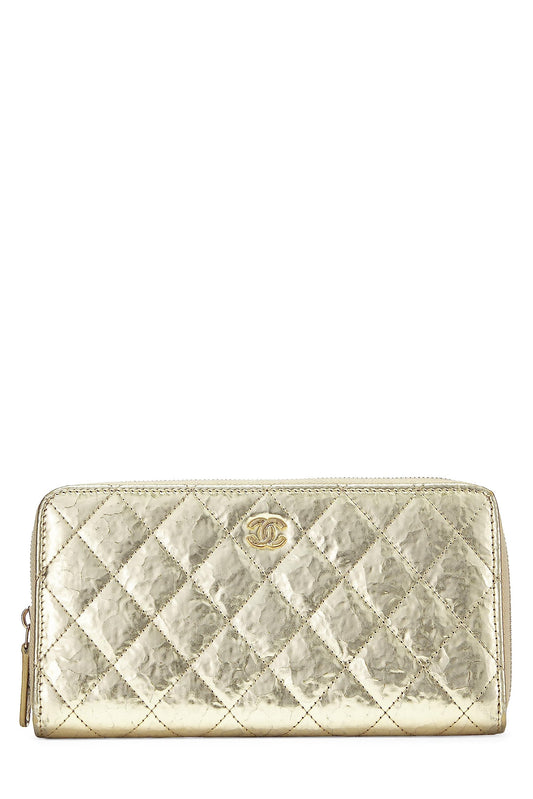 Chanel, Cartera con cremallera alrededor de piel de becerro dorada Pre-Loved, Dorado