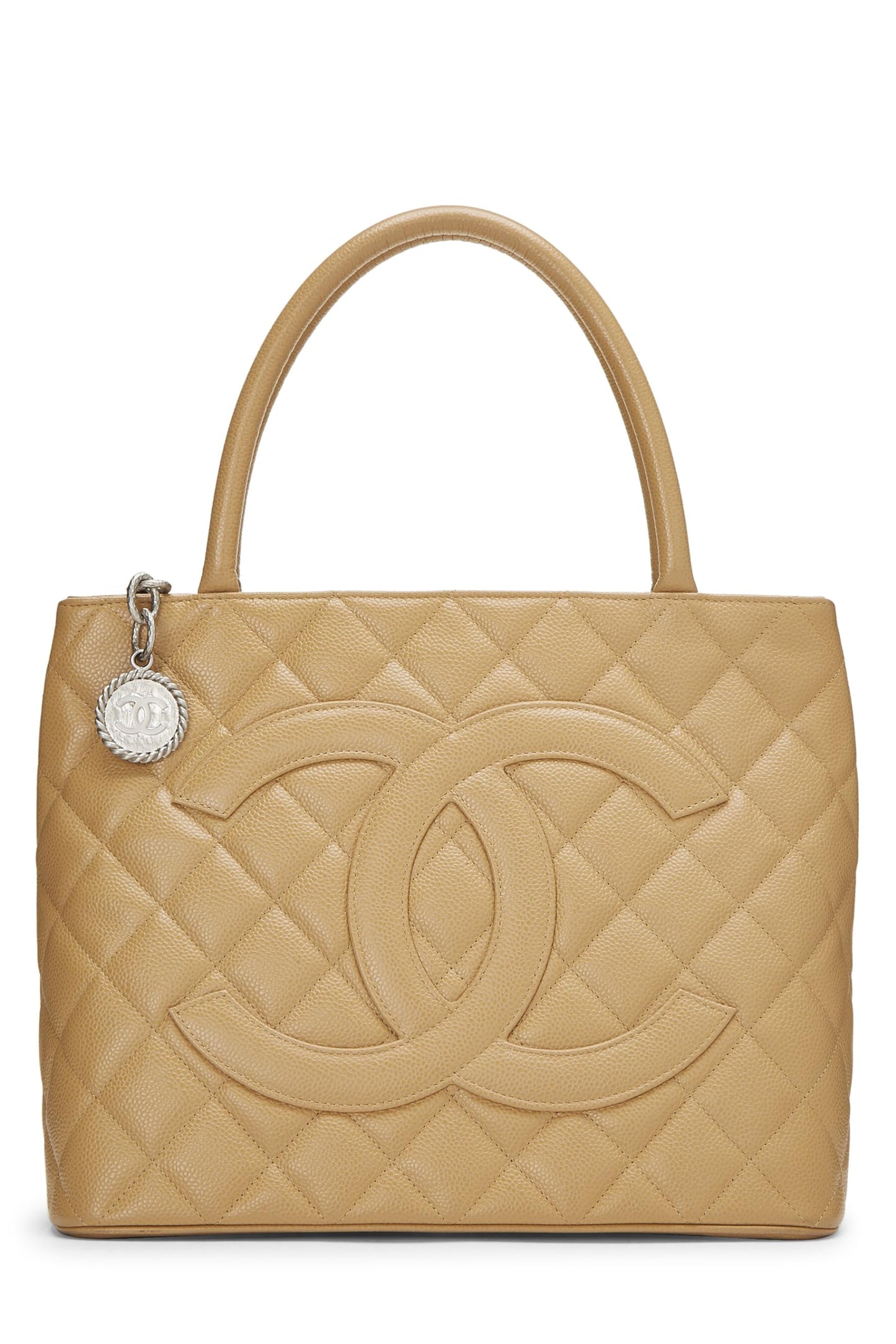 Chanel, sac fourre-tout matelassé à médaillon en caviar beige d'occasion, beige