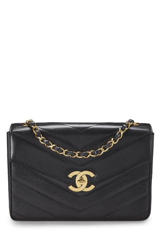 Chanel, enveloppe à rabat géante à chevrons Black Caviar d'occasion, noir