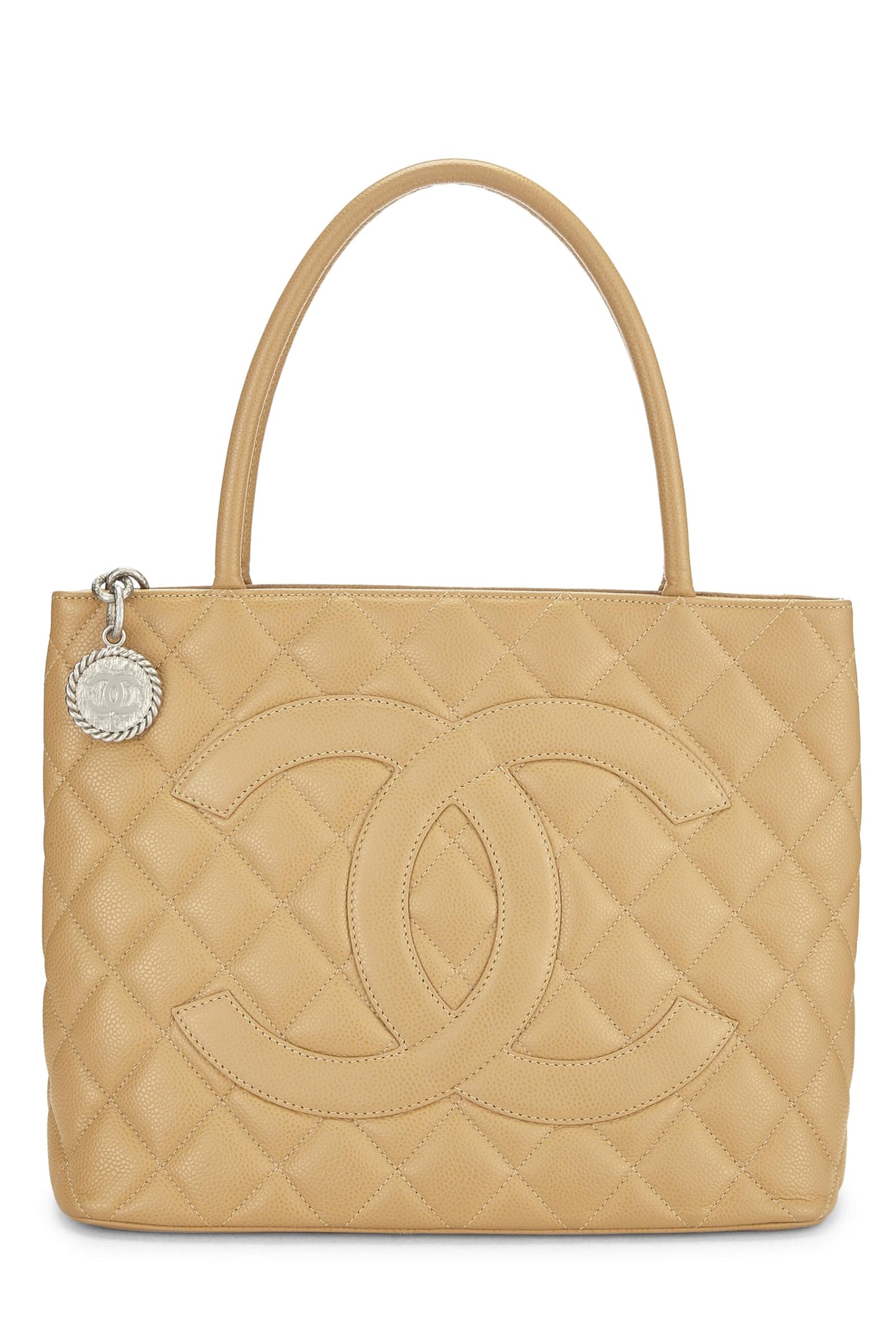 Chanel, Bolso tote con medallón de caviar acolchado beige Pre-Loved, Beige