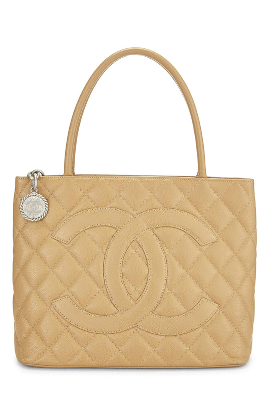 Chanel, sac fourre-tout matelassé à médaillon en caviar beige d'occasion, beige