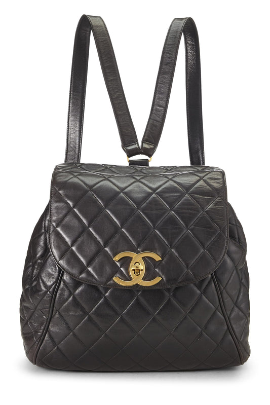 Chanel, sac à dos matelassé en cuir d'agneau noir d'occasion, grand modèle, noir