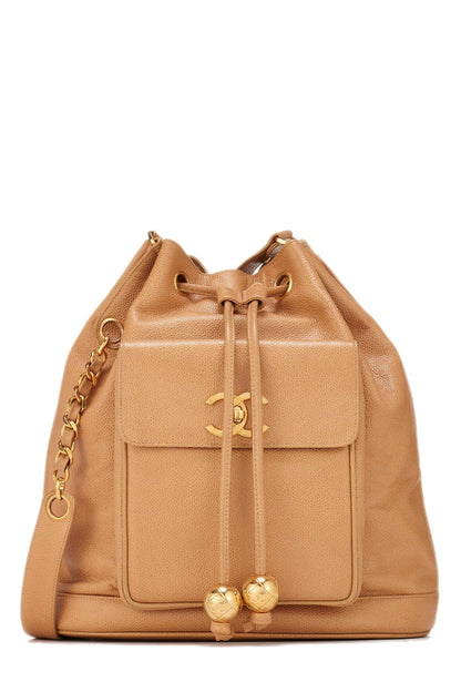 Chanel, sac seau caviar beige d'occasion, grand modèle, beige