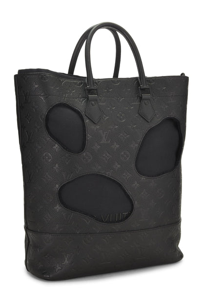 Louis Vuitton, Sac Empreinte monogramme noir avec trous COMME DES GARÇONS x Louis Vuitton pré-aimé, Noir