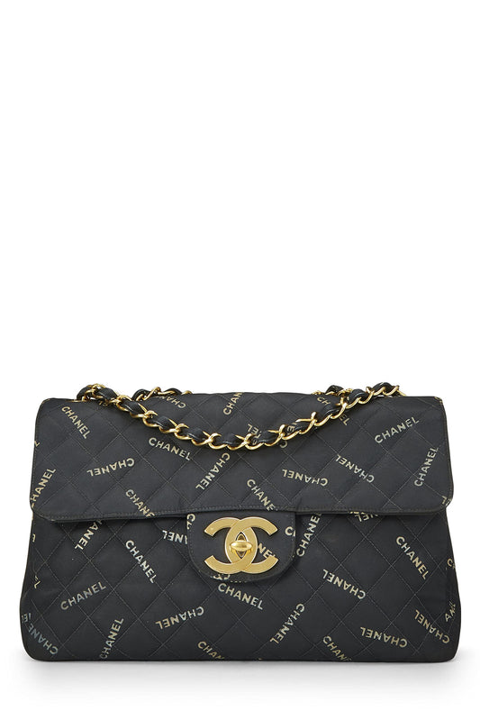 Chanel, Maxi sac à rabat demi-corps en toile noire avec logo d'occasion, noir