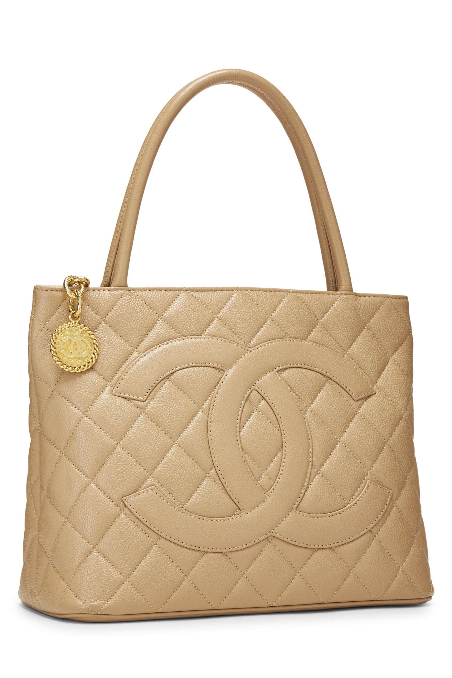 Chanel, sac fourre-tout matelassé à médaillon en caviar beige d'occasion, beige