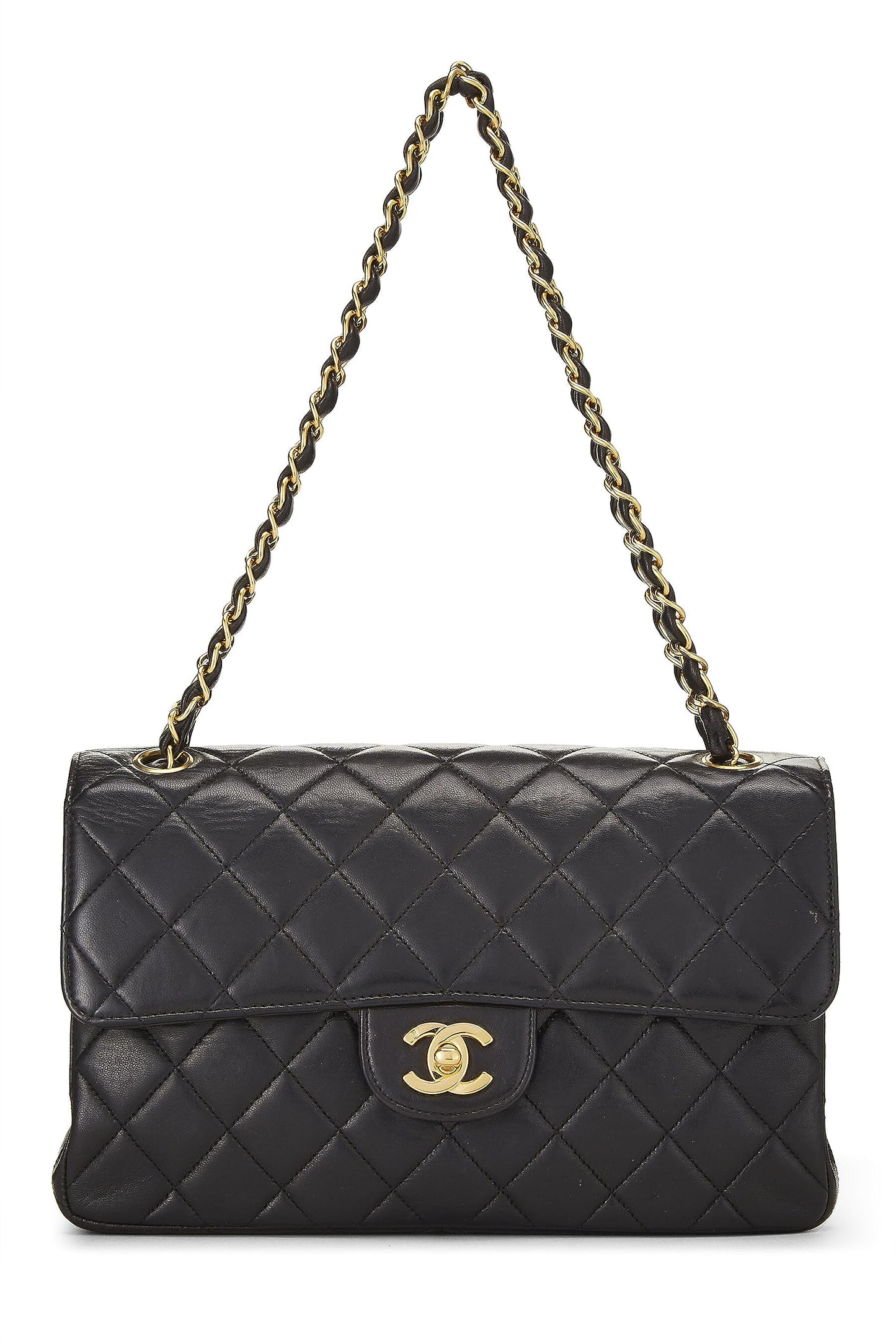 Chanel, sac à rabat classique double face en cuir d'agneau matelassé noir de taille moyenne, noir