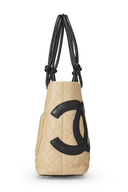 Chanel, sac cabas Cambon en cuir de veau matelassé beige d'occasion, petit modèle, beige