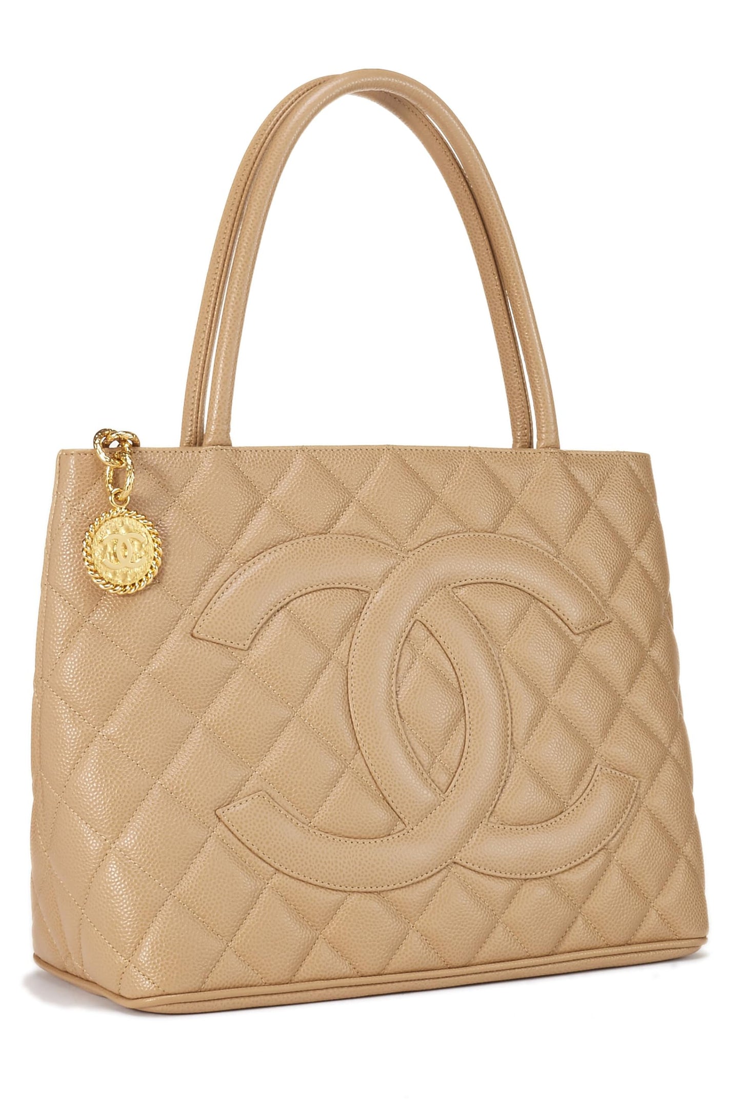 Chanel, sac fourre-tout matelassé à médaillon en caviar beige d'occasion, beige