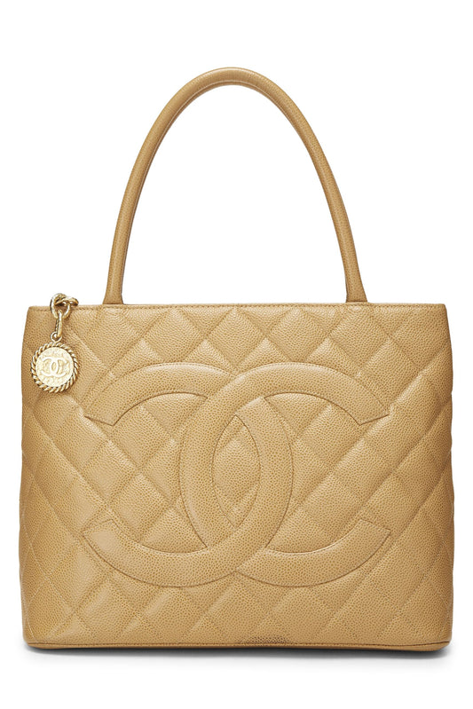 Chanel, sac fourre-tout matelassé à médaillon en caviar beige d'occasion, beige