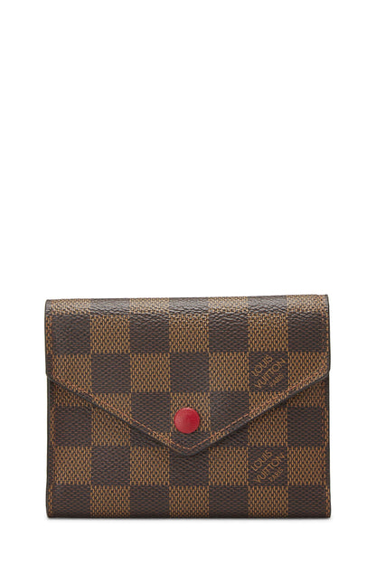 Louis Vuitton, Portefeuille Damier Ebene Victorine rouge pré-aimé, Rouge