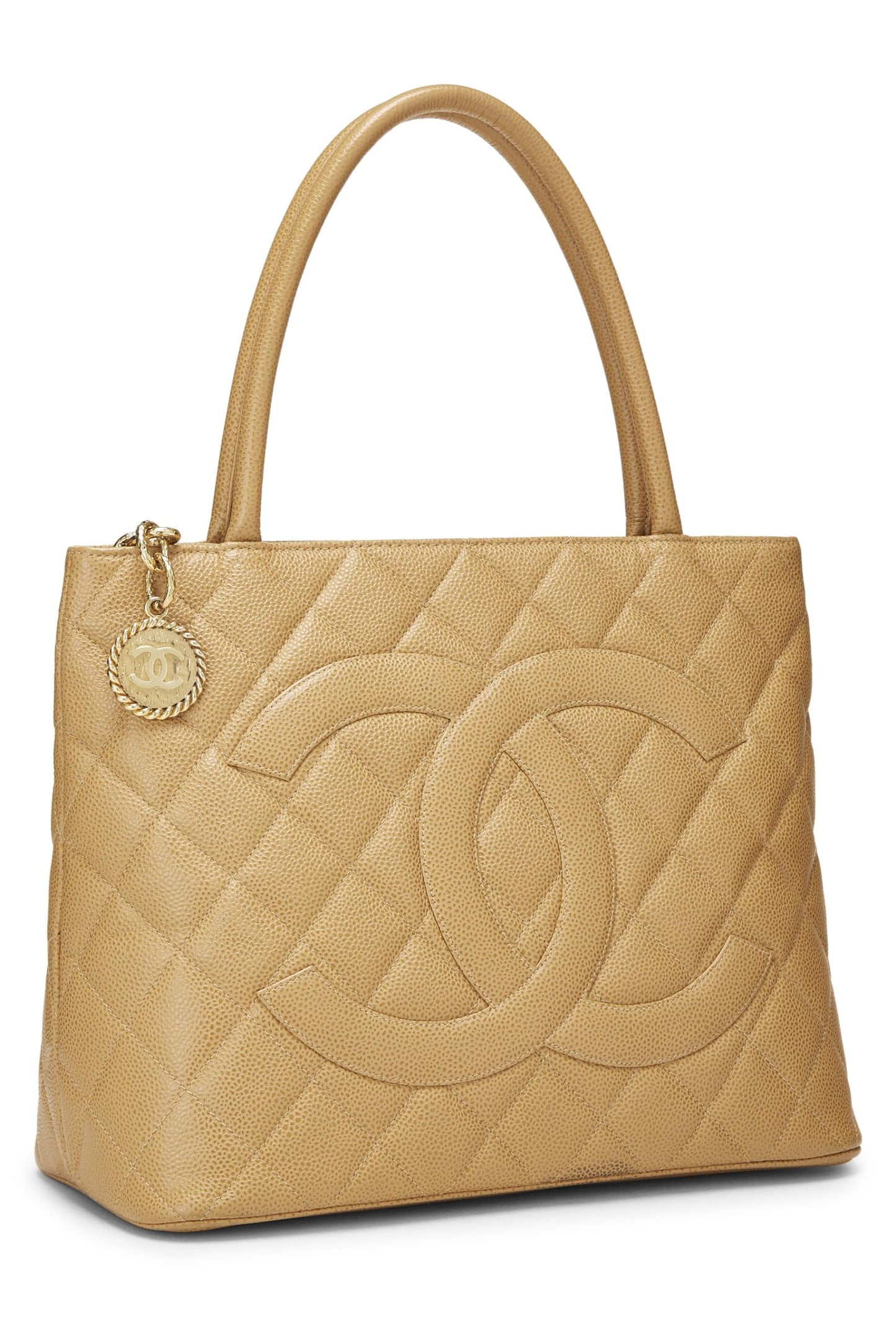 Chanel, sac fourre-tout matelassé à médaillon en caviar beige d'occasion, beige