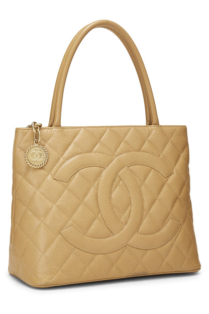 Chanel, Bolso tote con medallón de caviar acolchado beige Pre-Loved, Beige