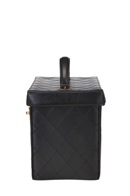 Chanel, trousse de toilette ronde « CC » en cuir d'agneau noir d'occasion, grande taille, noir