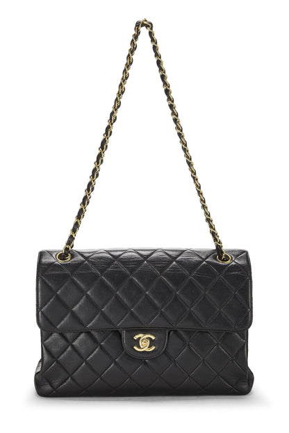 Chanel, sac à rabat classique double face en cuir d'agneau matelassé noir d'occasion, Jumbo, noir