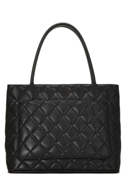 Chanel, sac fourre-tout matelassé noir à médaillon en caviar d'occasion, noir