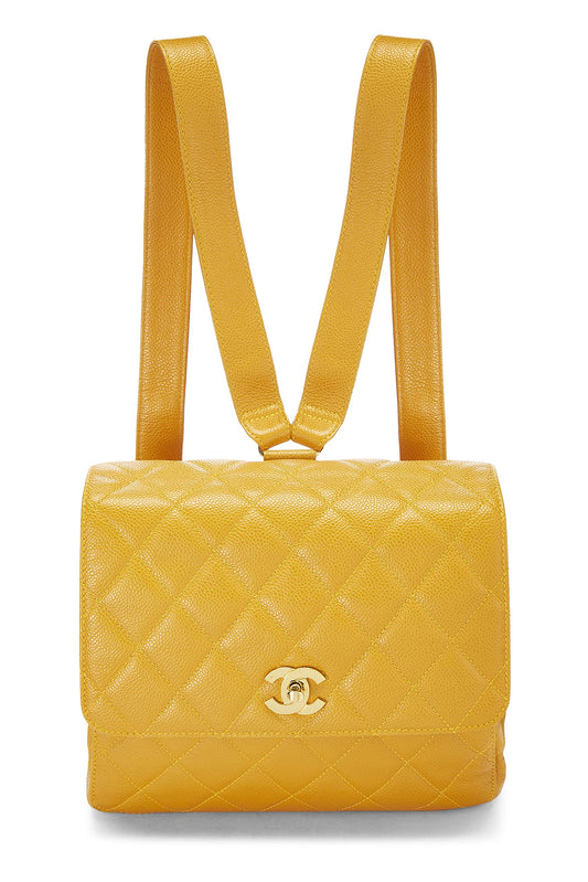 Chanel, sac à dos matelassé jaune caviar d'occasion, jaune