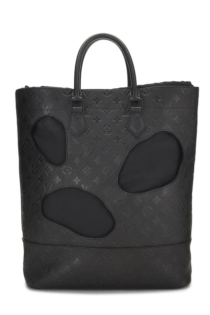 Louis Vuitton, Sac Empreinte monogramme noir avec trous COMME DES GARÇONS x Louis Vuitton pré-aimé, Noir