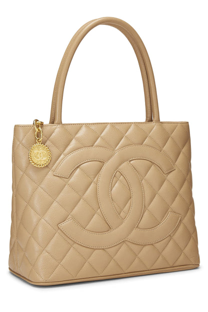 Chanel, sac fourre-tout matelassé à médaillon en caviar beige d'occasion, beige