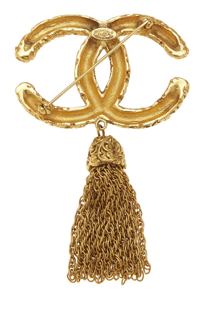 Chanel, broche à pompon « CC » en or d'occasion, or