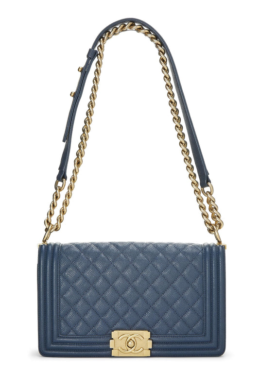 Chanel, sac Boy Caviar matelassé bleu d'occasion de taille moyenne, bleu