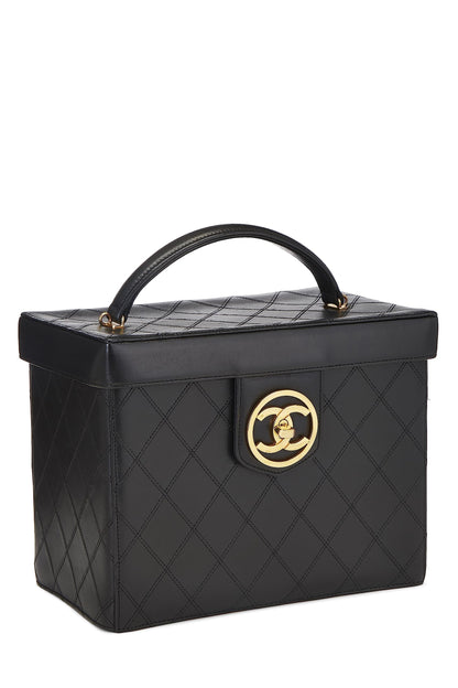 Chanel, trousse de toilette ronde « CC » en cuir d'agneau noir d'occasion, grande taille, noir