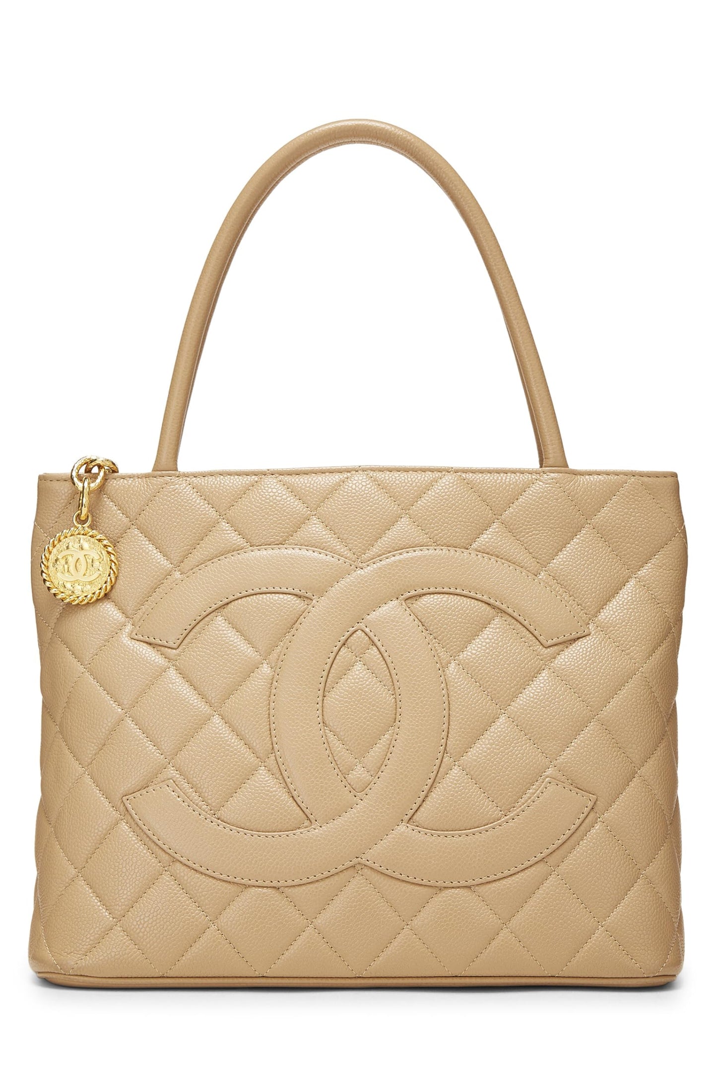 Chanel, sac fourre-tout matelassé à médaillon en caviar beige d'occasion, beige