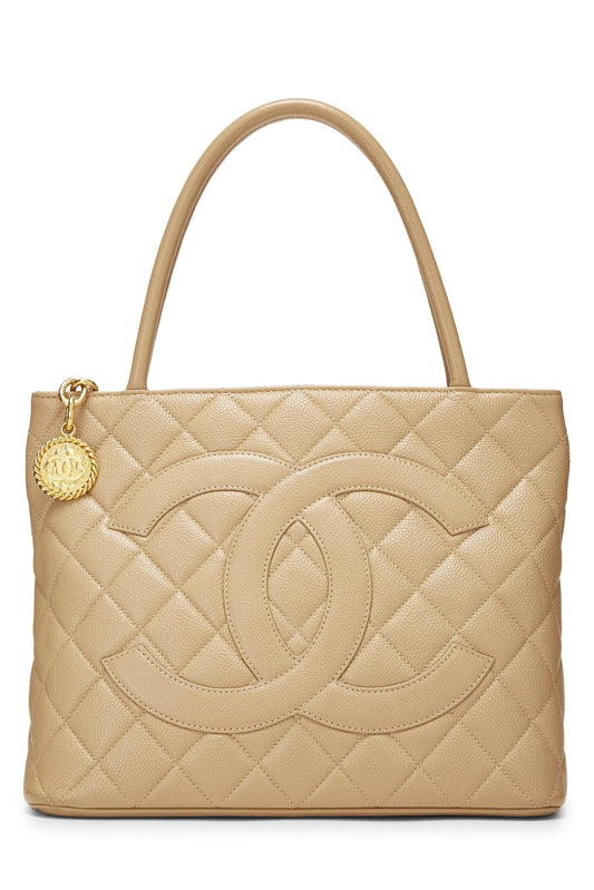 Chanel, Bolso tote con medallón de caviar acolchado beige Pre-Loved, Beige