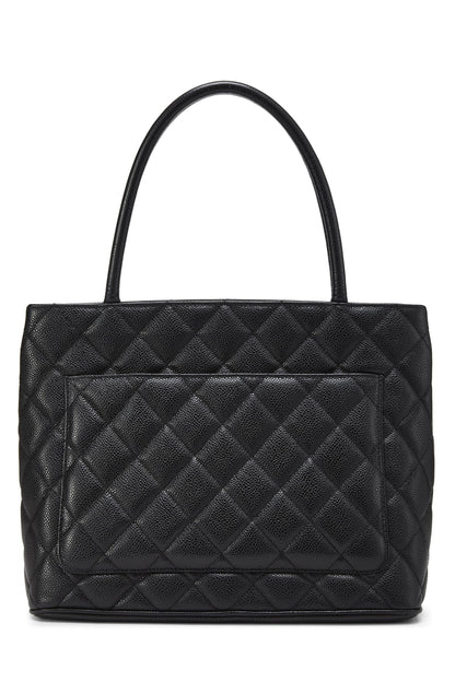 Chanel, sac fourre-tout matelassé noir à médaillon en caviar d'occasion, noir