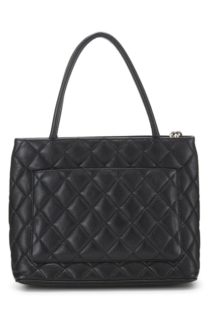 Chanel, sac fourre-tout matelassé noir à médaillon en caviar d'occasion, noir