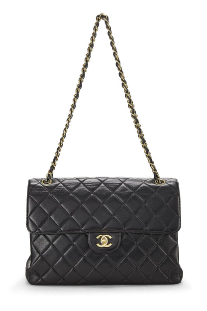 Chanel, sac à rabat classique double face en cuir d'agneau matelassé noir d'occasion, Jumbo, noir