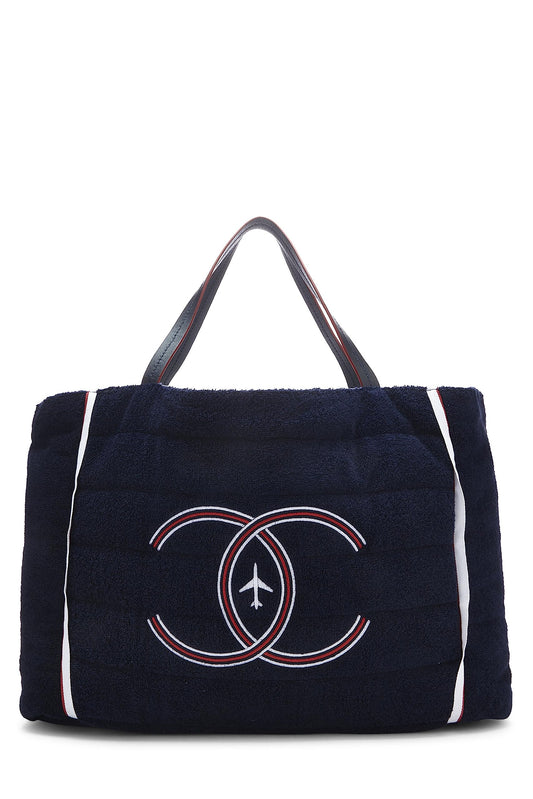 Chanel, sac fourre-tout réversible en tissu éponge bleu marine et nylon argenté, grand modèle, argenté