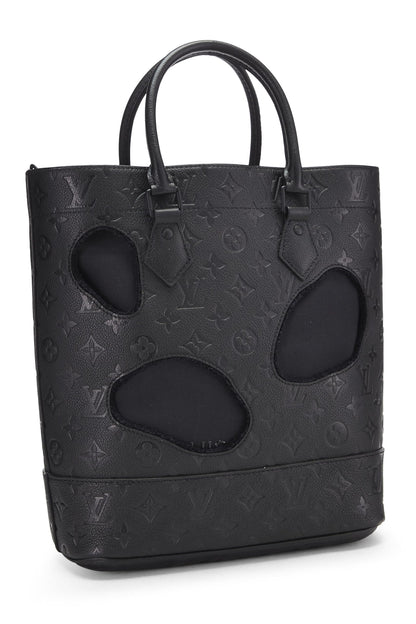 Louis Vuitton, Sac Empreinte monogramme noir avec trous COMME DES GARÇONS x Louis Vuitton pré-aimé, Noir