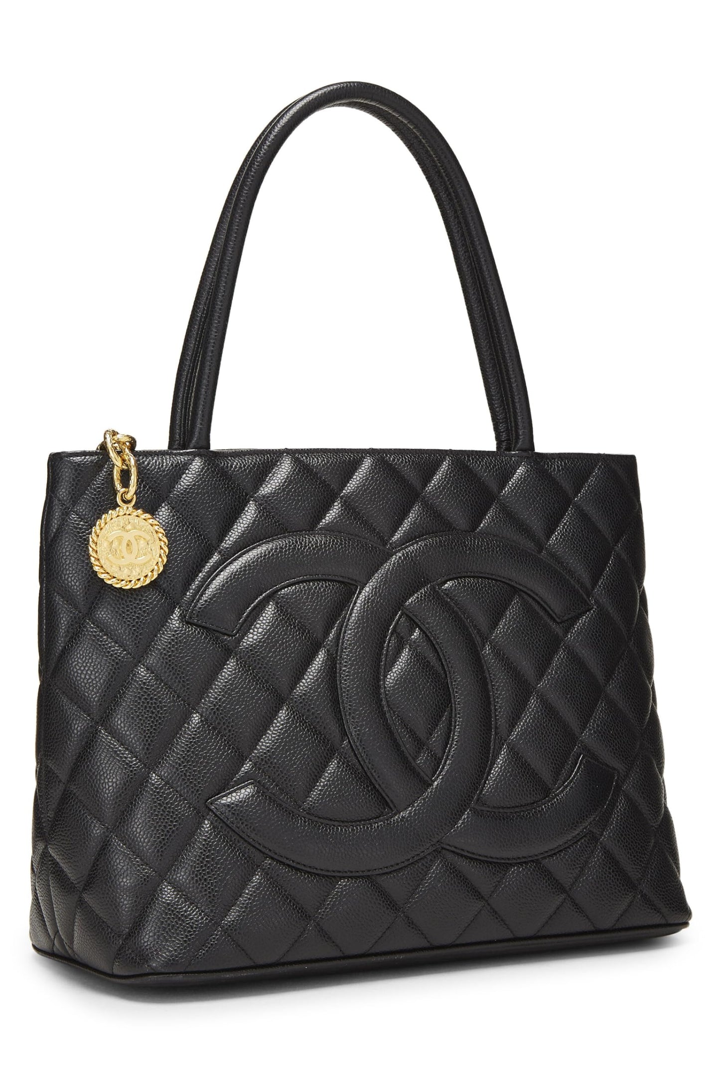 Chanel, sac fourre-tout matelassé noir à médaillon en caviar d'occasion, noir