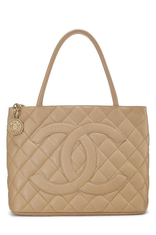 Chanel, sac fourre-tout matelassé à médaillon en caviar beige d'occasion, beige