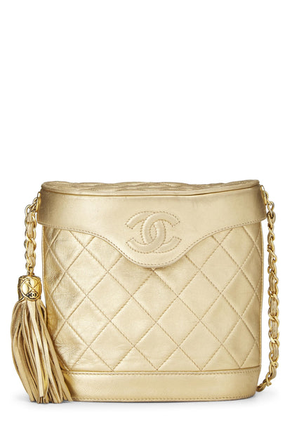 Chanel, sac pour jumelles en cuir d'agneau matelassé doré d'occasion, petit modèle, doré