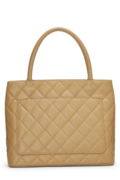 Chanel, Bolso tote con medallón de caviar acolchado beige Pre-Loved, Beige