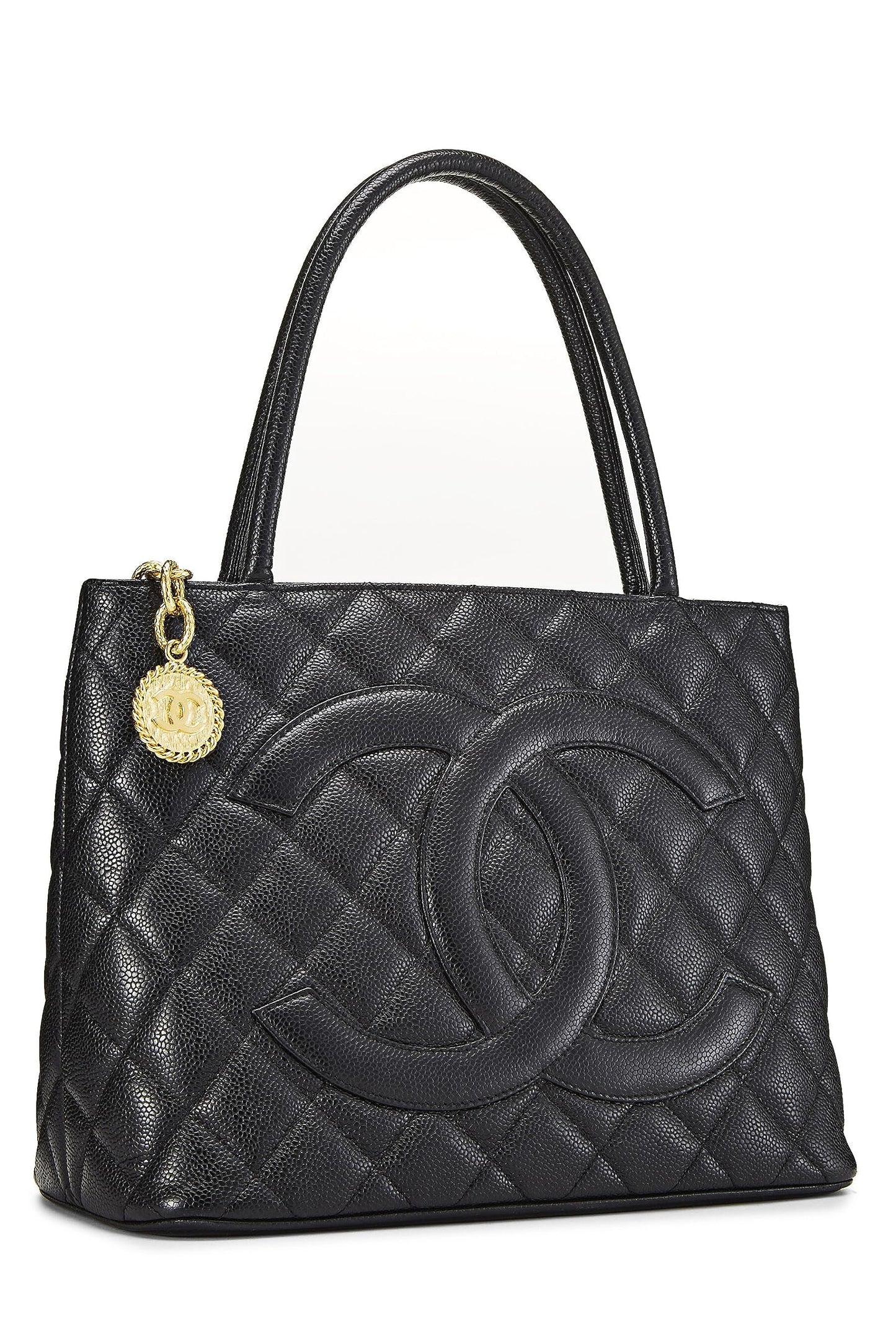 Chanel, sac fourre-tout matelassé noir à médaillon en caviar d'occasion, noir