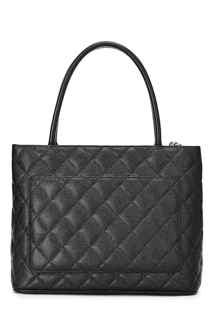 Chanel, sac fourre-tout matelassé noir à médaillon en caviar d'occasion, noir