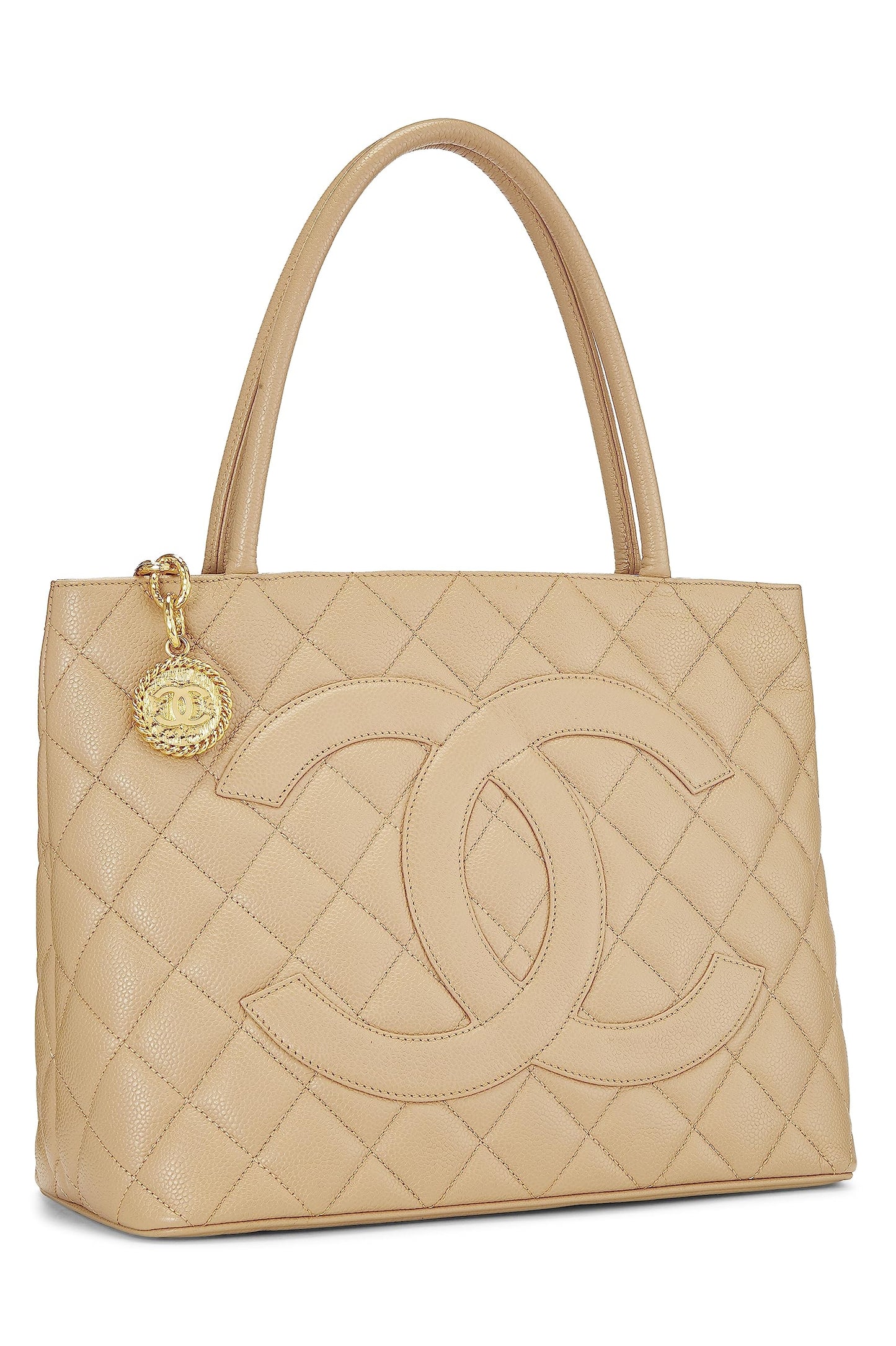 Chanel, sac fourre-tout matelassé à médaillon en caviar beige d'occasion, beige