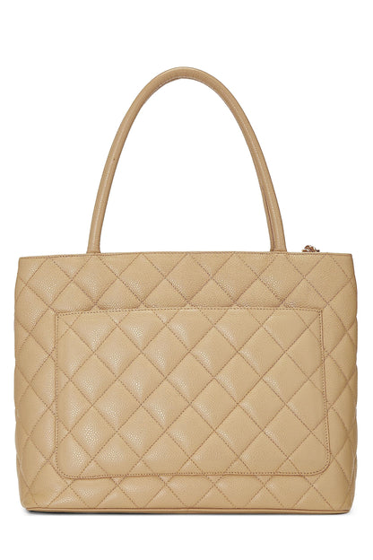 Chanel, sac fourre-tout matelassé à médaillon en caviar beige d'occasion, beige