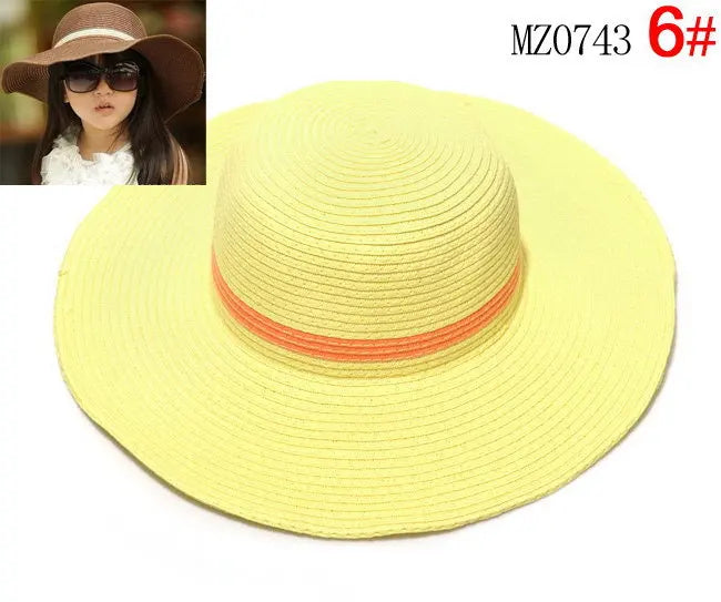 2014 Venta al por mayor 7 colores verano Niños sólido Simple elegante sombrero de paja de ala grande niñas sombreros de playa sombrero de sol 10 uds/lote