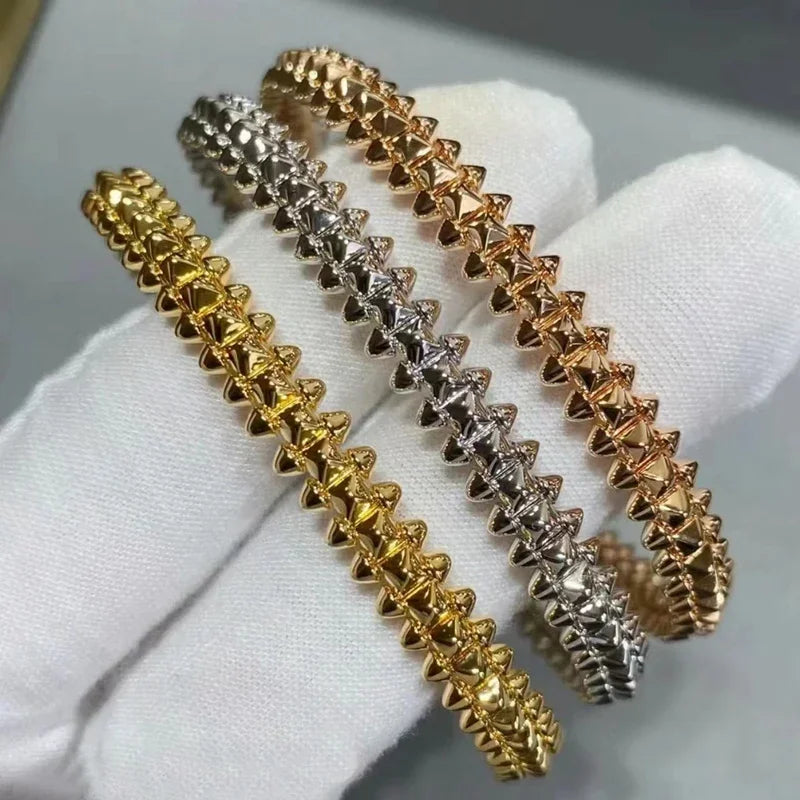 Pulsera de acero de titanio con remaches de oro K galvanizado CY con forma de bala giratoria para hombre, regalo de fiesta punk para mujer, joyería de lujo que no se decolora