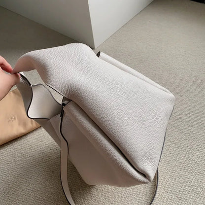 Sac à main polyvalent en cuir de veau avec bandoulière simple et sac seau carré