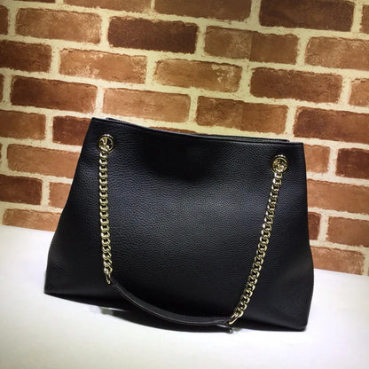 Elegante artículo básico para todos los días: lujoso bolso negro con correa de cadena dorada y elegante detalle circular Diseño versátil para todas las ocasiones