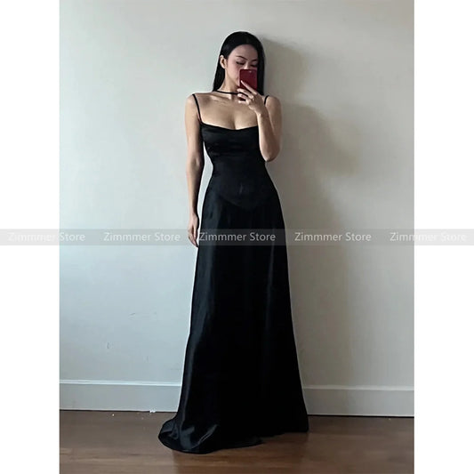 Sentido superior del estilo francés Hepburn, vestidos negros con cuello halter, sentido de las mujeres de la celebridad, vestidos largos con cintura, vestidos de cumpleaños