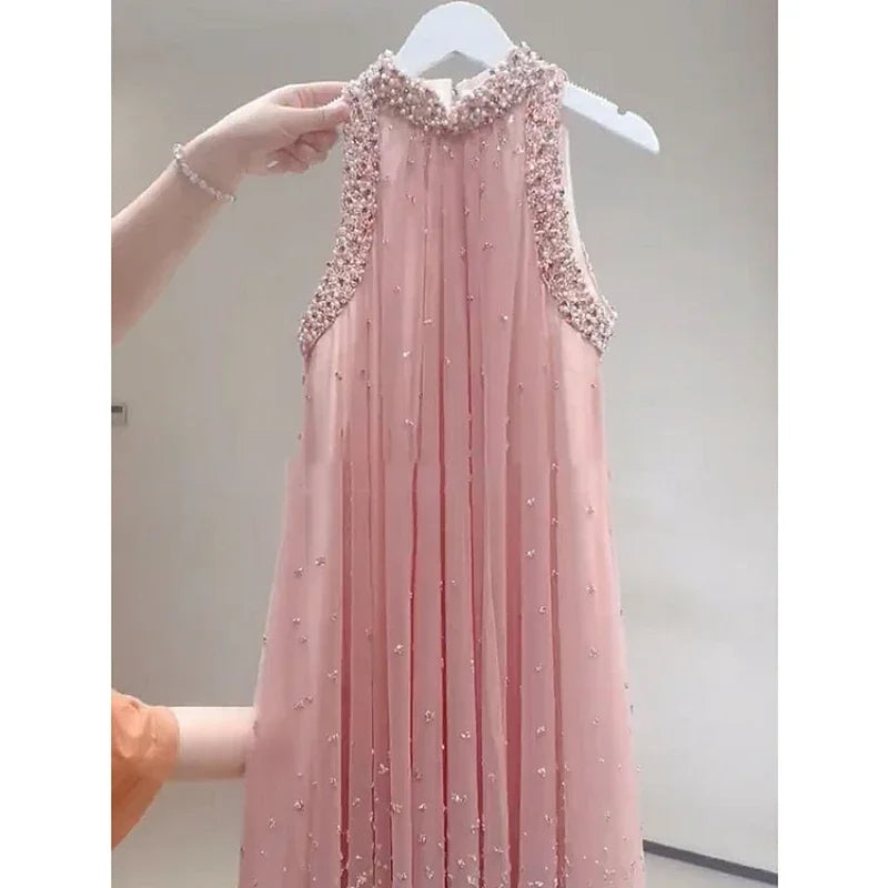 Vestido largo de fiesta rosa dulce de línea A suelto sin mangas con cuello redondo y cuentas de industria pesada estilo hada de moda para mujer verano 2024